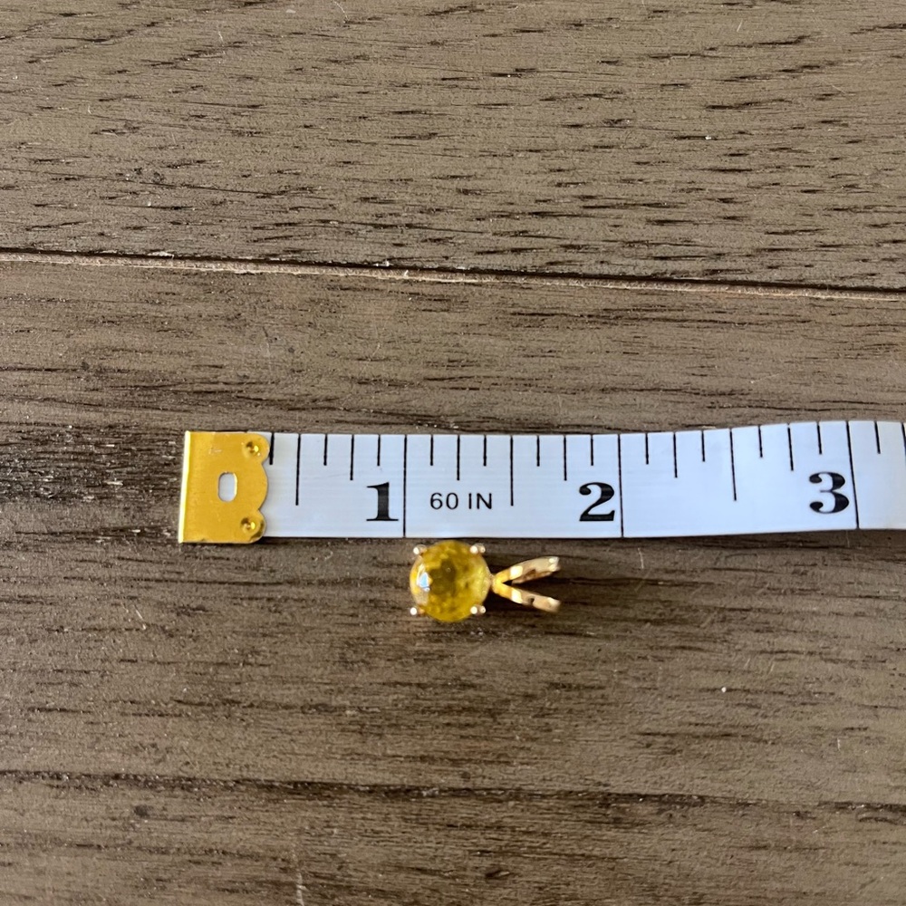 Elegant Gold set yellow beryl pendant.